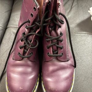 Dr Martens purple lace up boots.